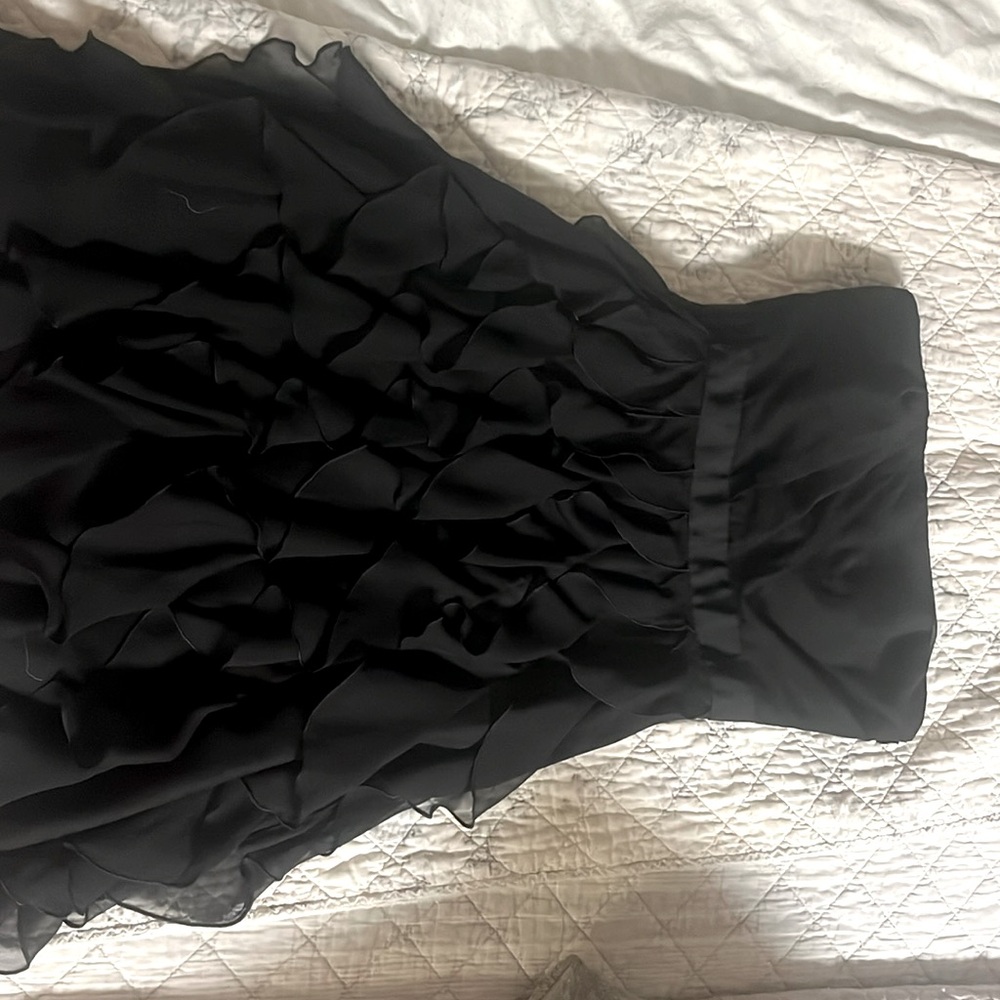 Gorgeous black cocktail dress with removable single shoulder strap.